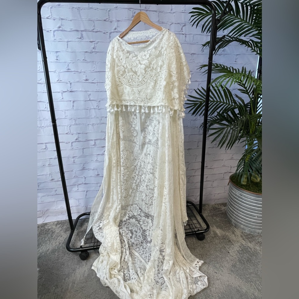 Elegant Lace Gown with Cape